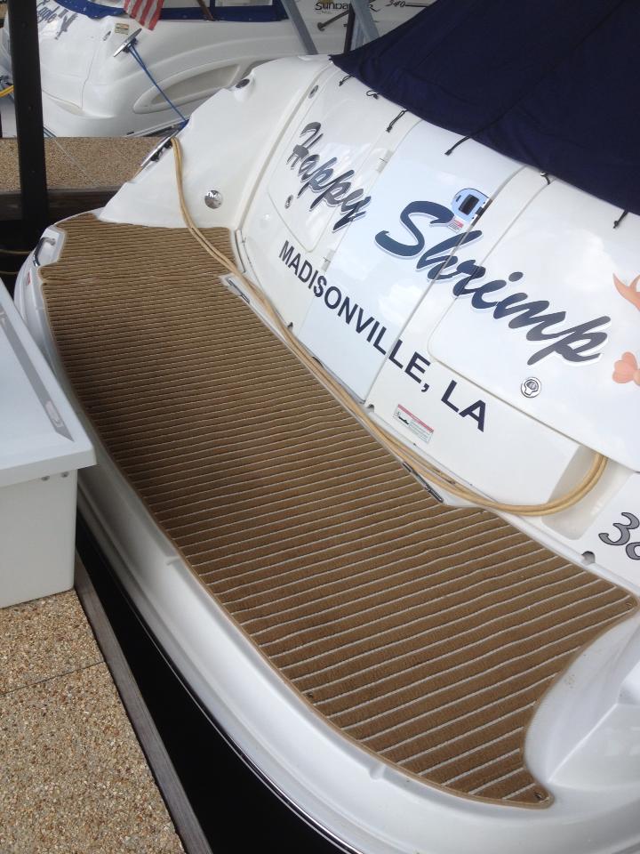 service2 (2) Deck of a boat named "Happy Shrimp".