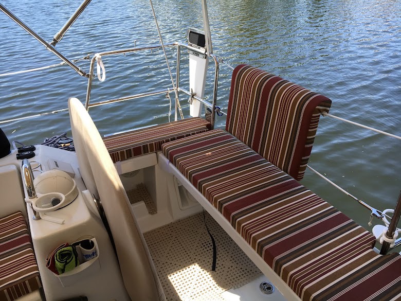 IMG_7790 Striped boat seats overlooking the water.